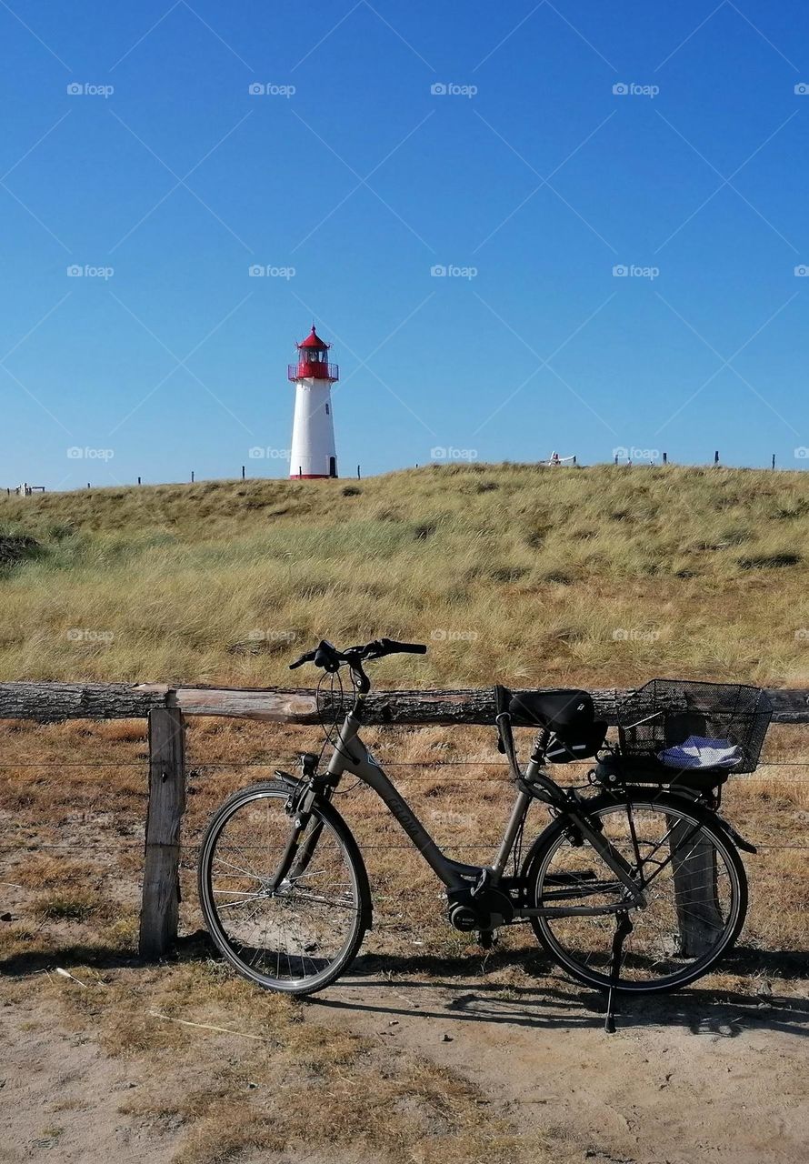 Lighthouse and the bicycle