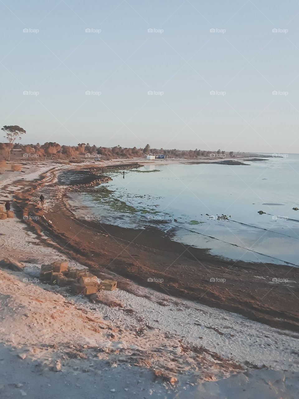 A sandy beach from the beaches of the island of Djerba, close to the fishing port
At this time, there are few pedestrians