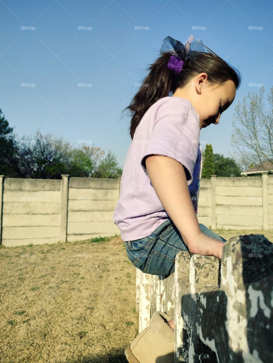 Sitting on old concrete wall