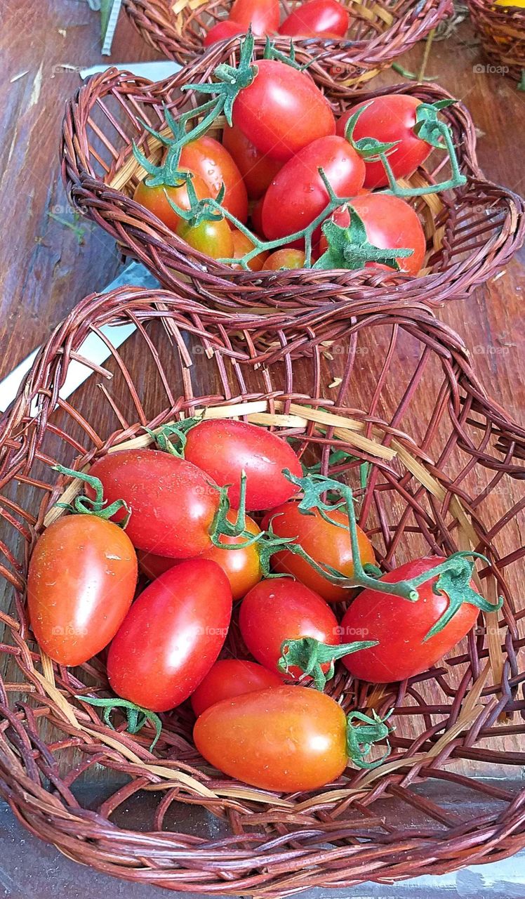 Tomato. Market. Tomatoes in Basket