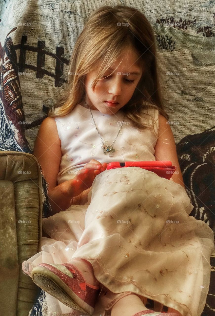 Young Girl Using Mobile Device
