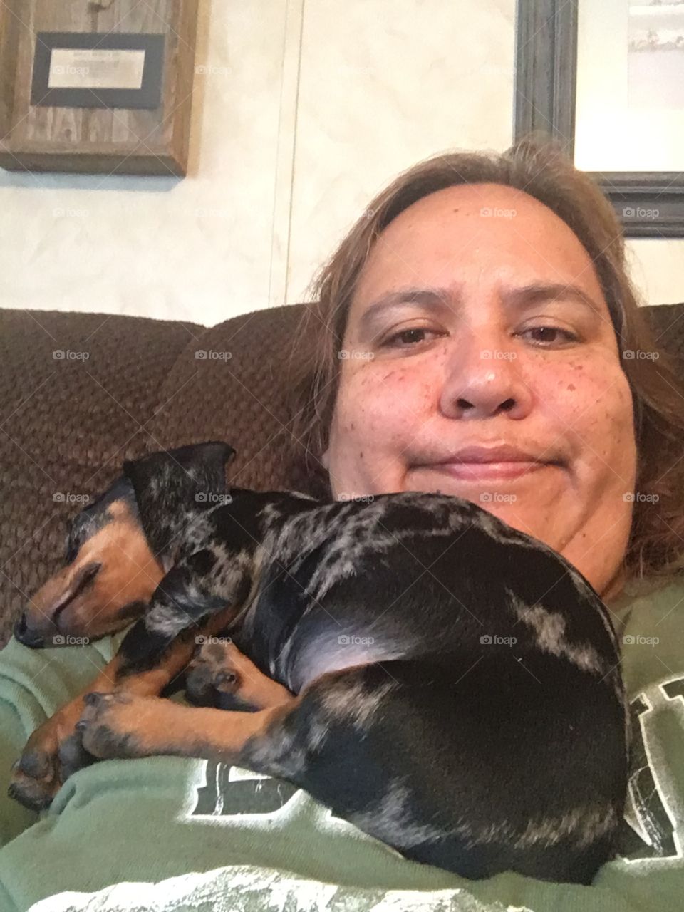 Close-up of a woman with her pet dog