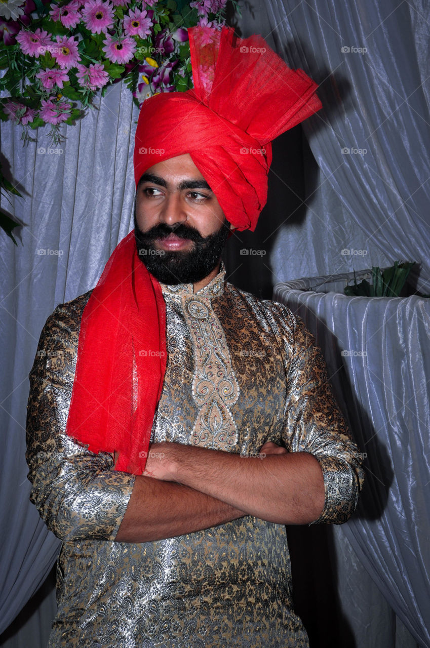 traditional outfit and a traditional Maratha look for an indian marriage posing attitude