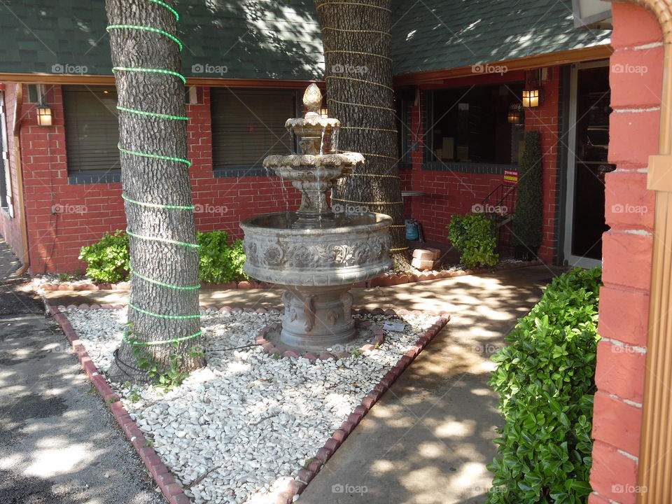Italian restaurant 🍴. This is a picture of a water 💦 fountain out front on display at a Italian restaurant in Jacksboro Texas