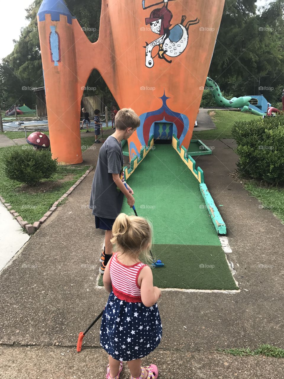 Mini golf with children hole-in-one