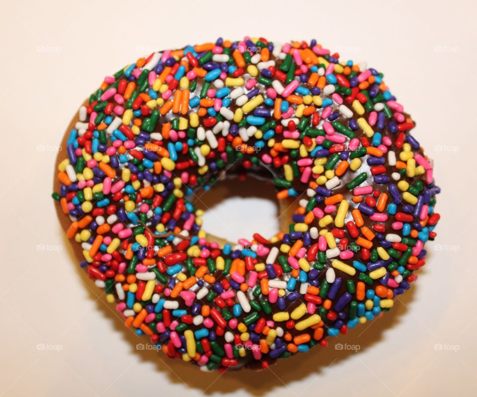 Brightly colored sprinkled donut