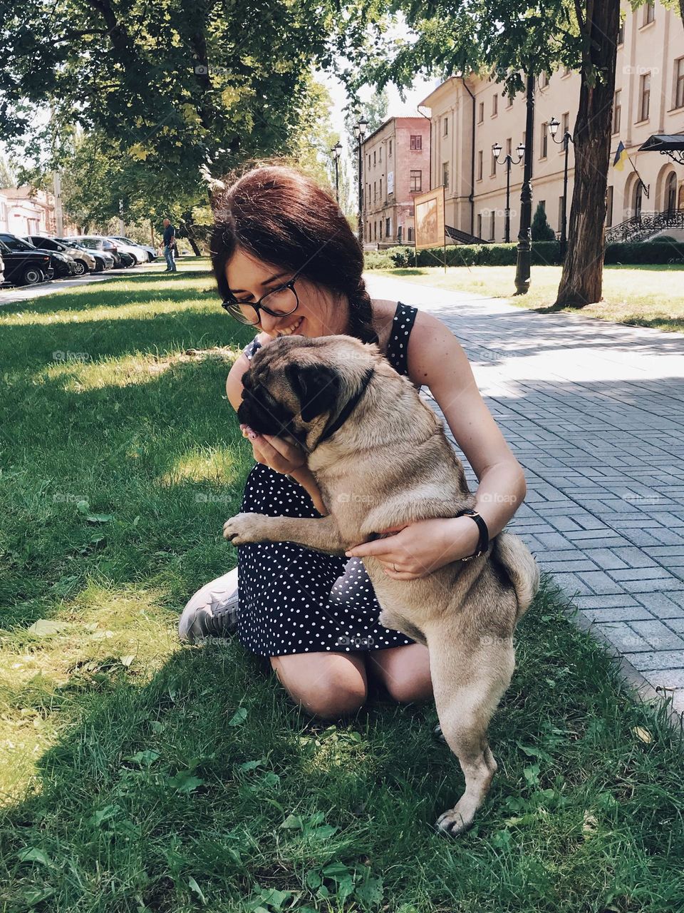 Happiness. Girl with dog