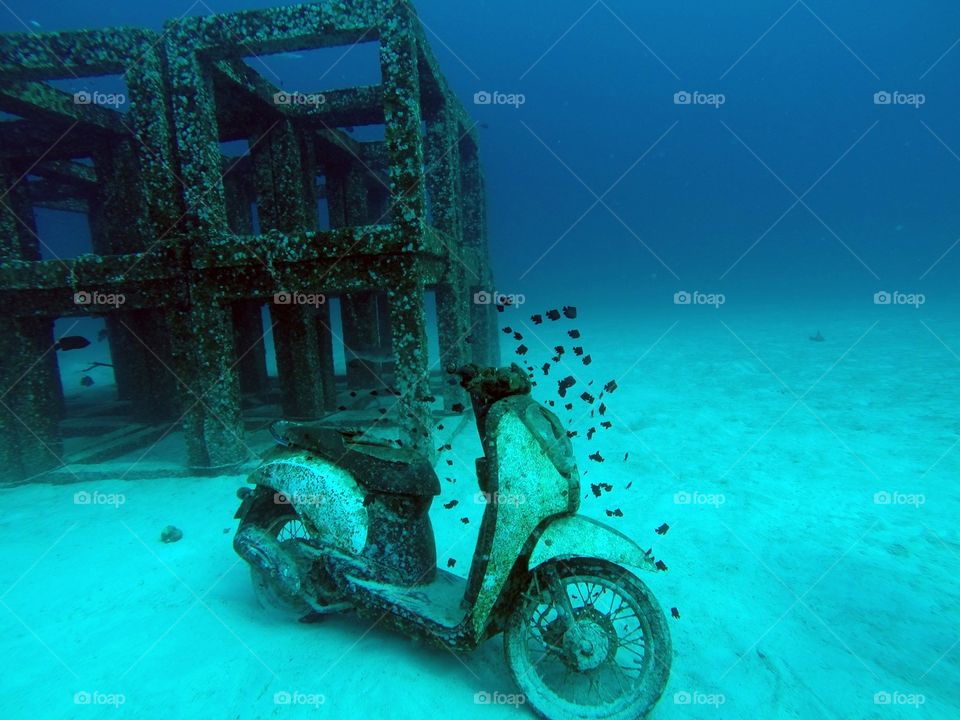 Motor bike at the bottom of the ocean