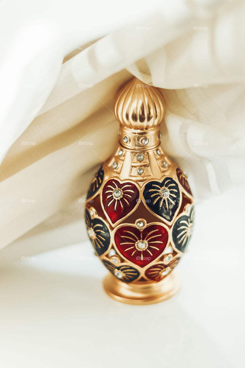 Arab perfume on bottle gold