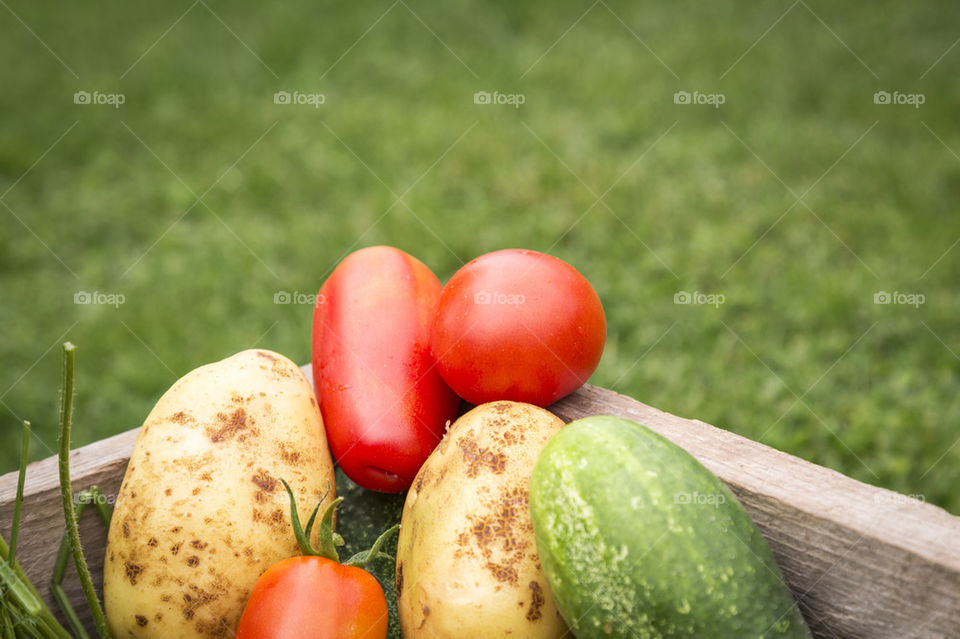 Mixed vegetables in wooden box