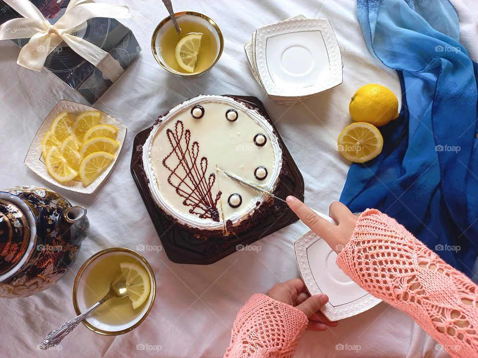 composition tea with cake, tea with lemon,