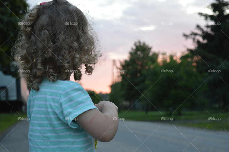 Girl trying to makes bubbles