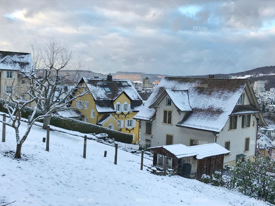 Snow covered houses in Switzerland 
