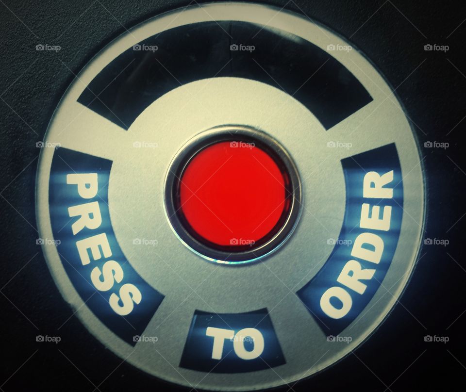 Close-up of press order button