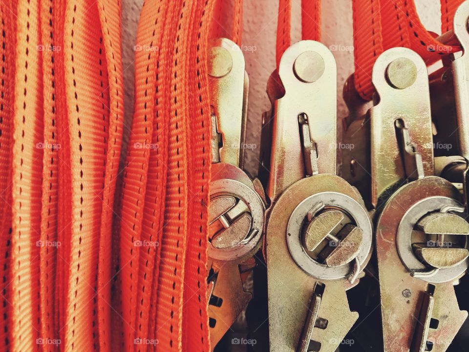 metal lock with orange belt