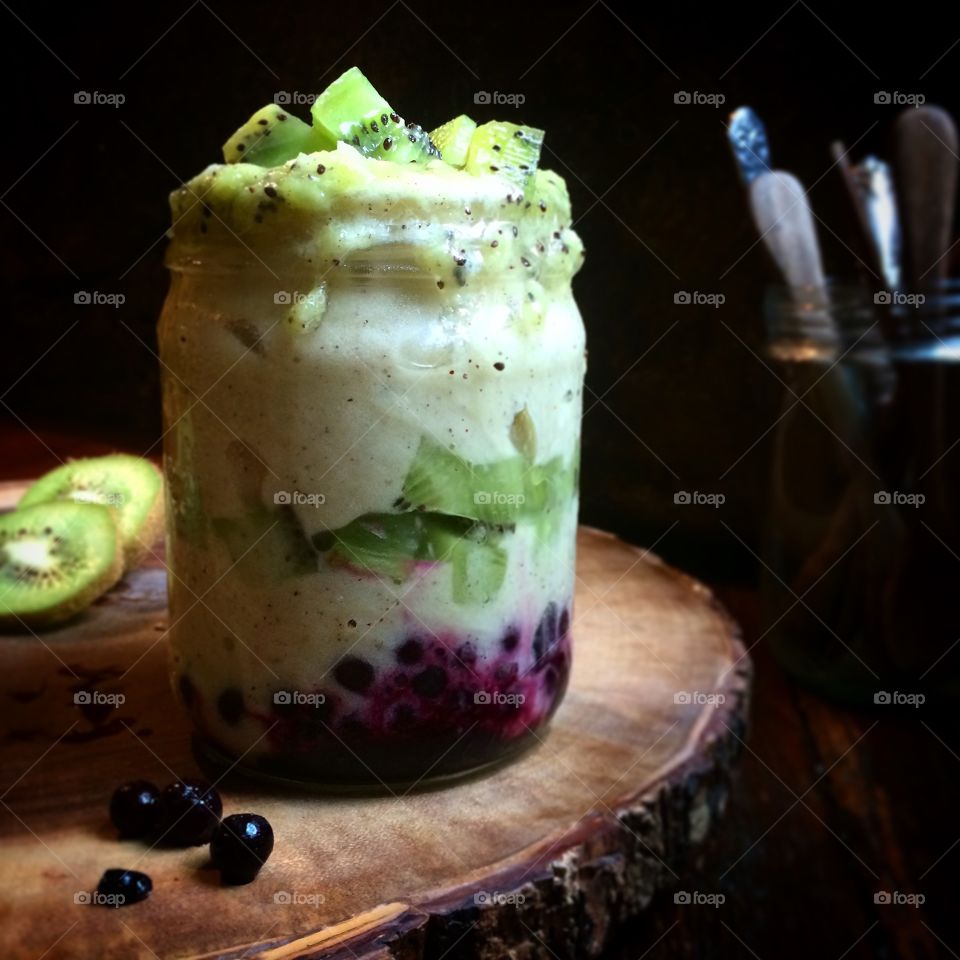 Blueberry Kiwi Parfait with nice cream. Blended frozen banana ice cream with chopped kiwi and blueberries. 