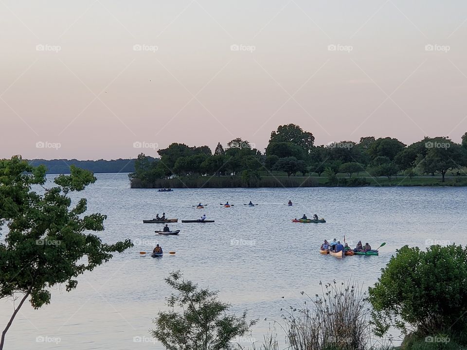 Kayaks on White Rock Lake listening to Dallas Arboretum Concert