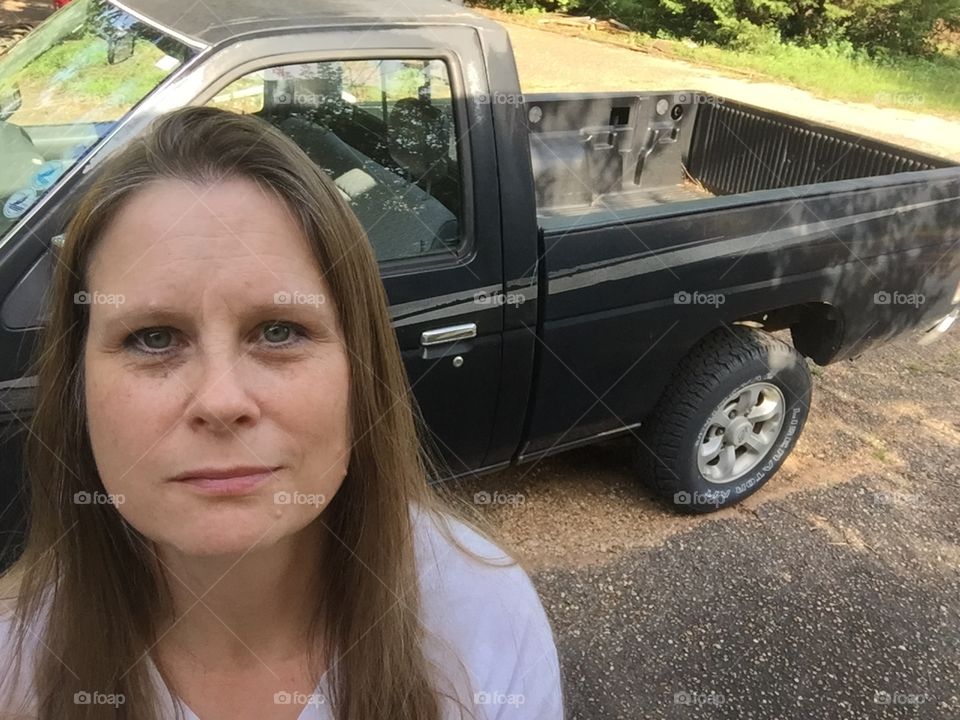 Selfie in front of a truck