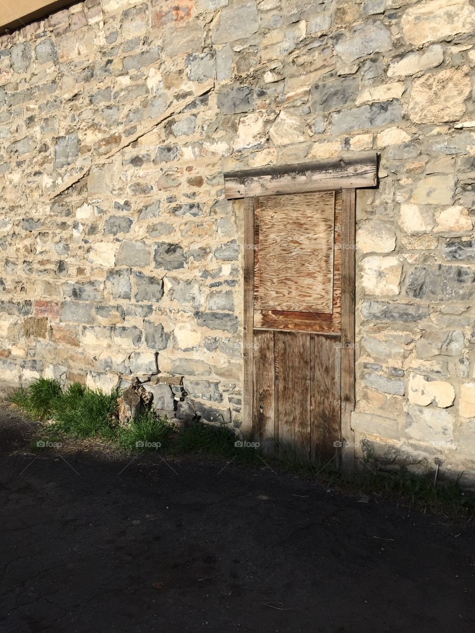 Wooden Door in Rock Wall