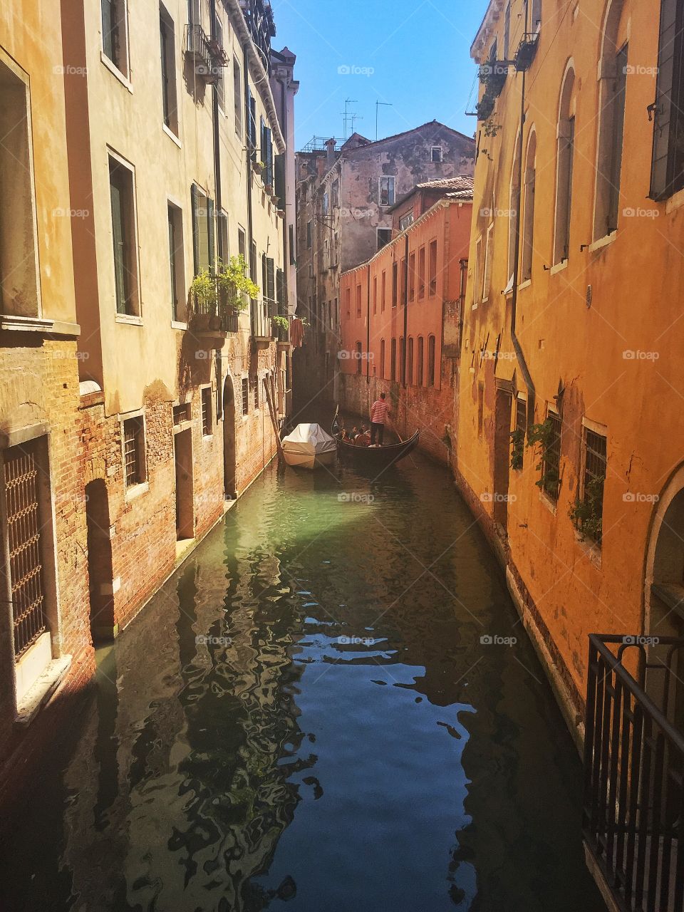 Gondola in narrow canal