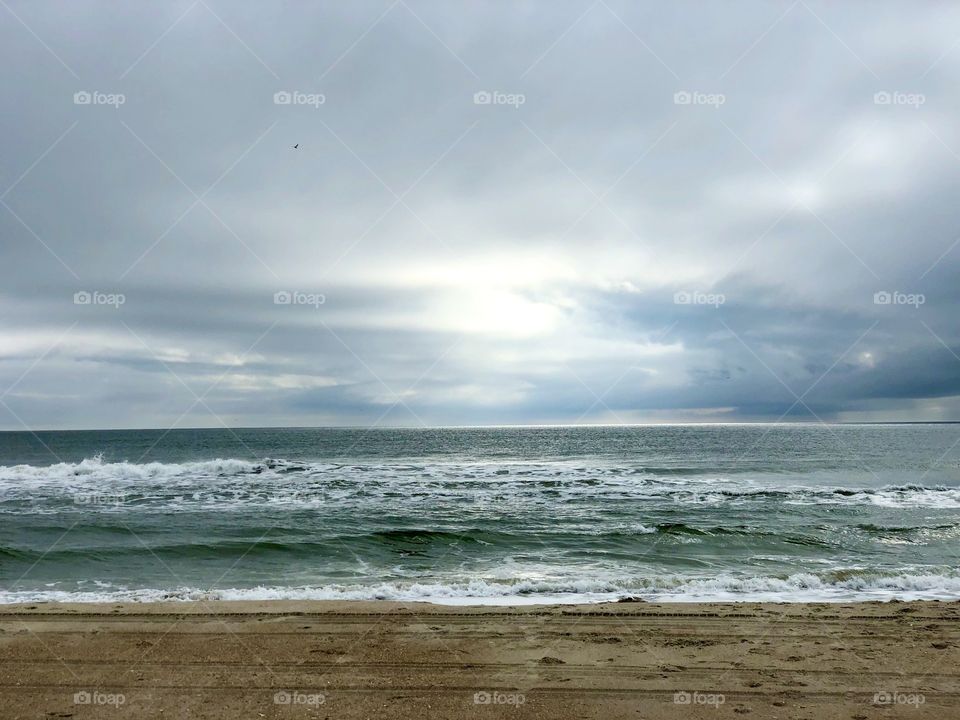 East cost beach during sunset on a brisk, cloudy day