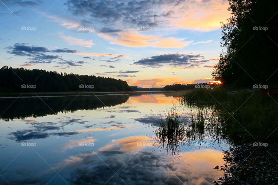 Sunset  over  river  in  Sweden 