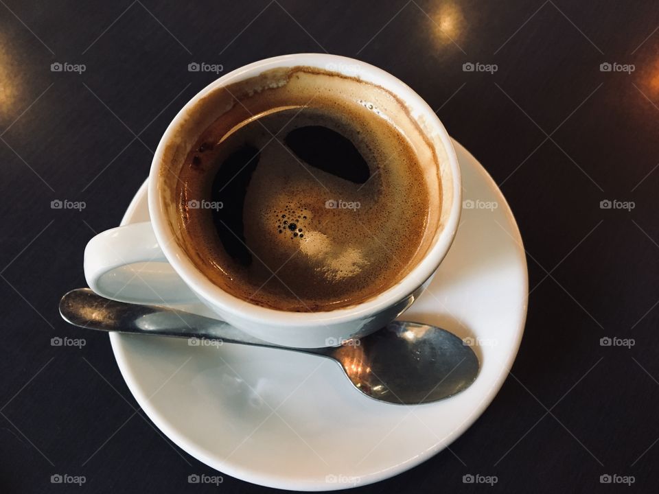 A cap of long black coffee at the cafe.