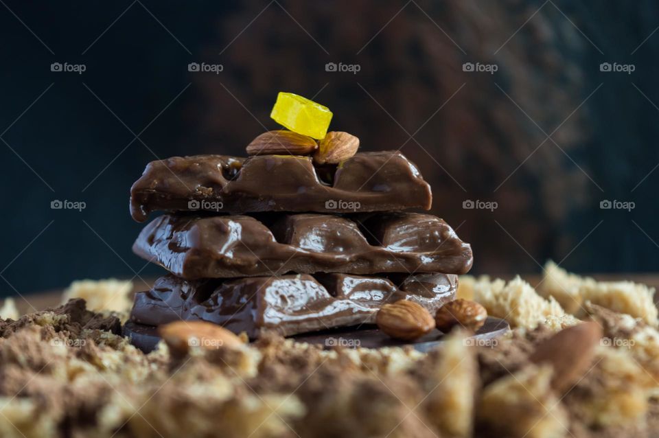 Single Yellow candy on chocolate bars.