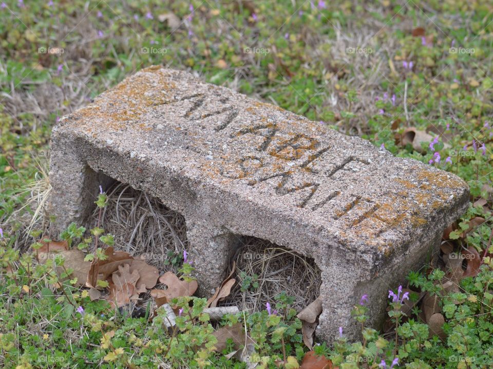 Primitive grave marker in a historical cemetery. 