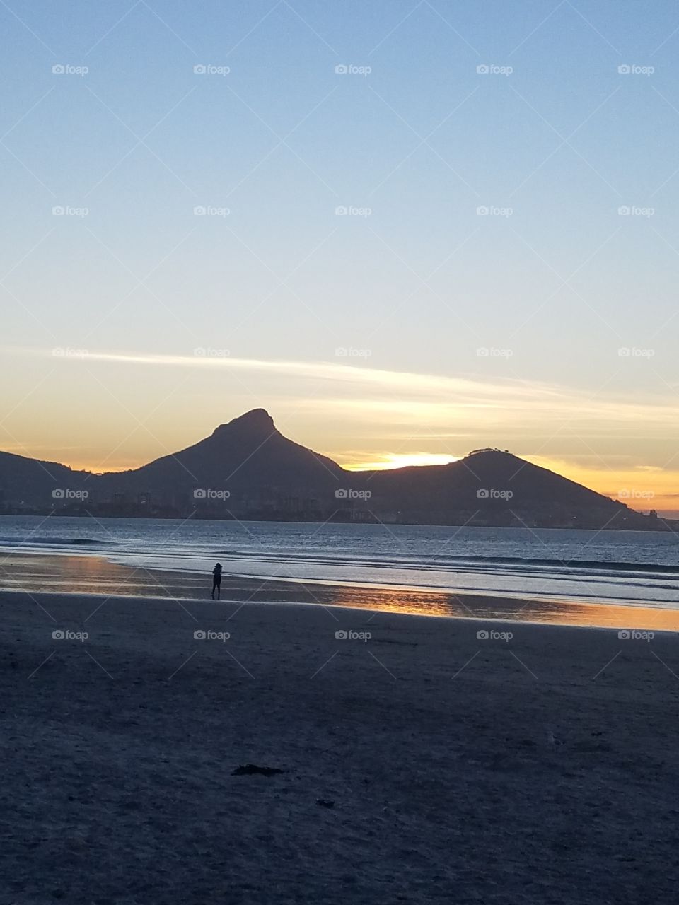 sunset on South African beach. Lions head and Signal hill