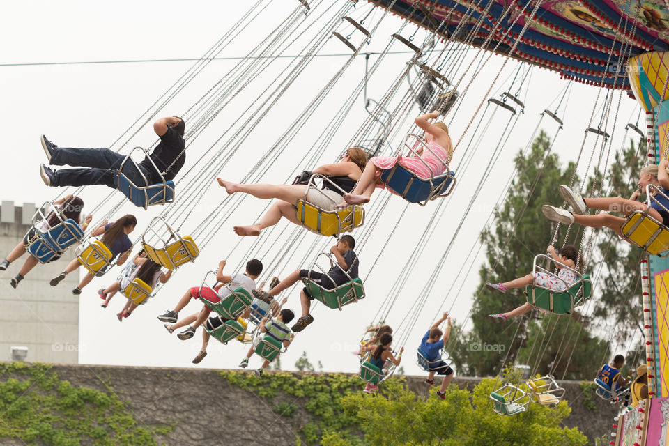 Carnival Carousel riders closeup