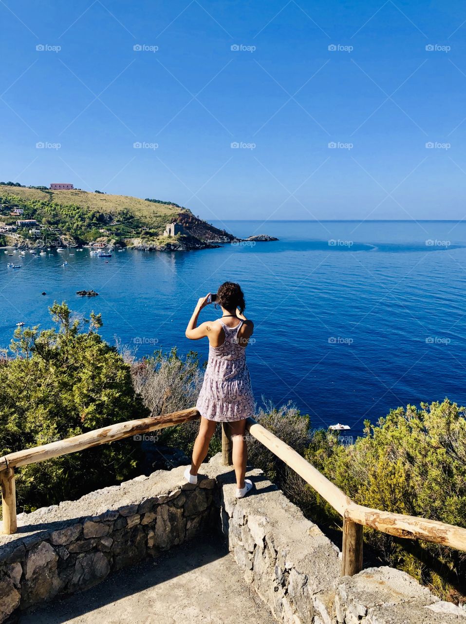 Taking pictures of an amazing view, Calabria, South Italy 
