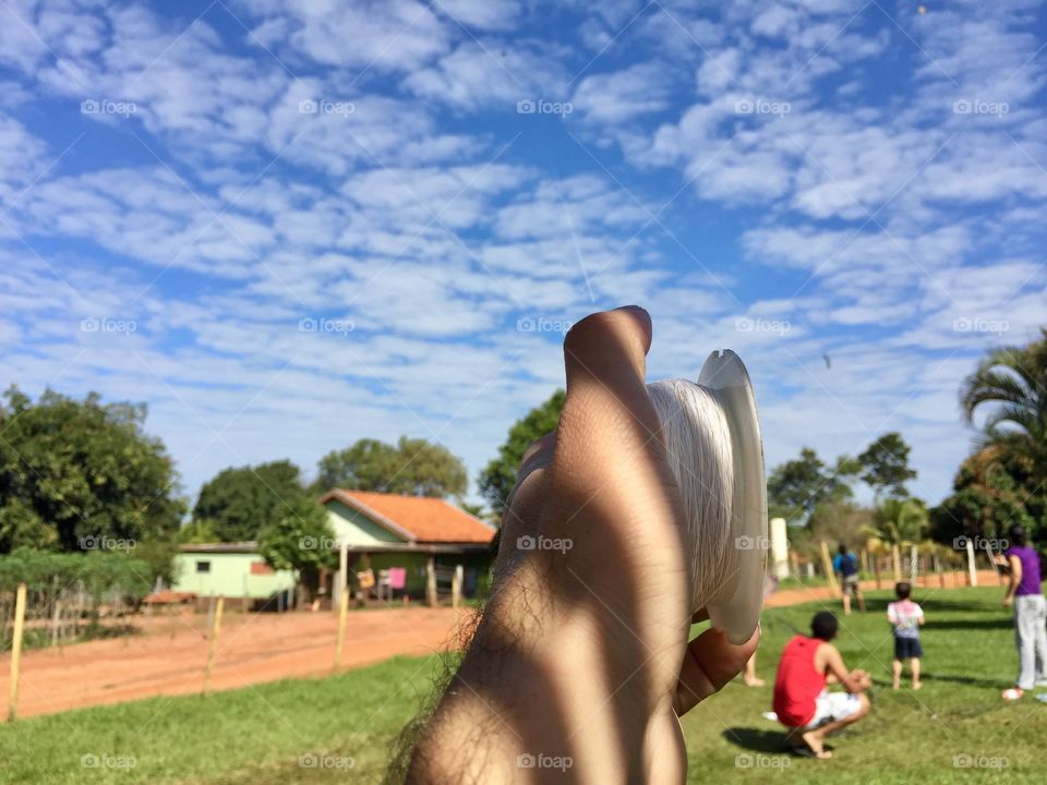 Flying kites. 