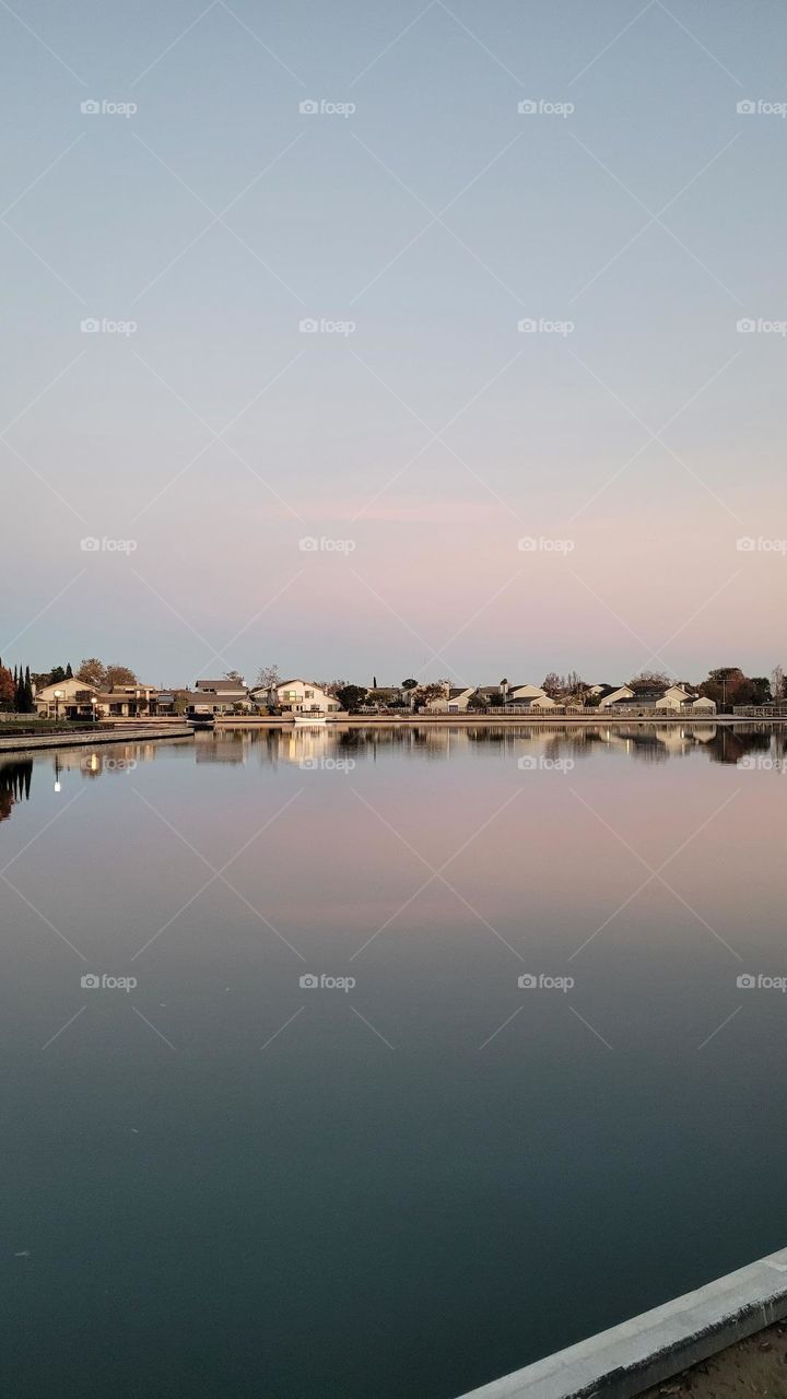 reflection of houses on the water