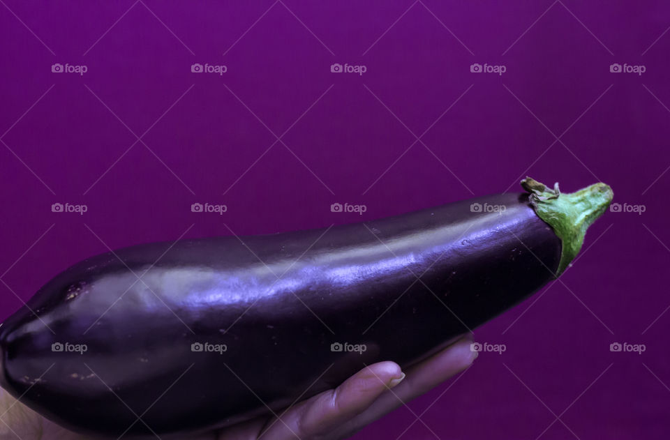 Eggplant on Purple background 