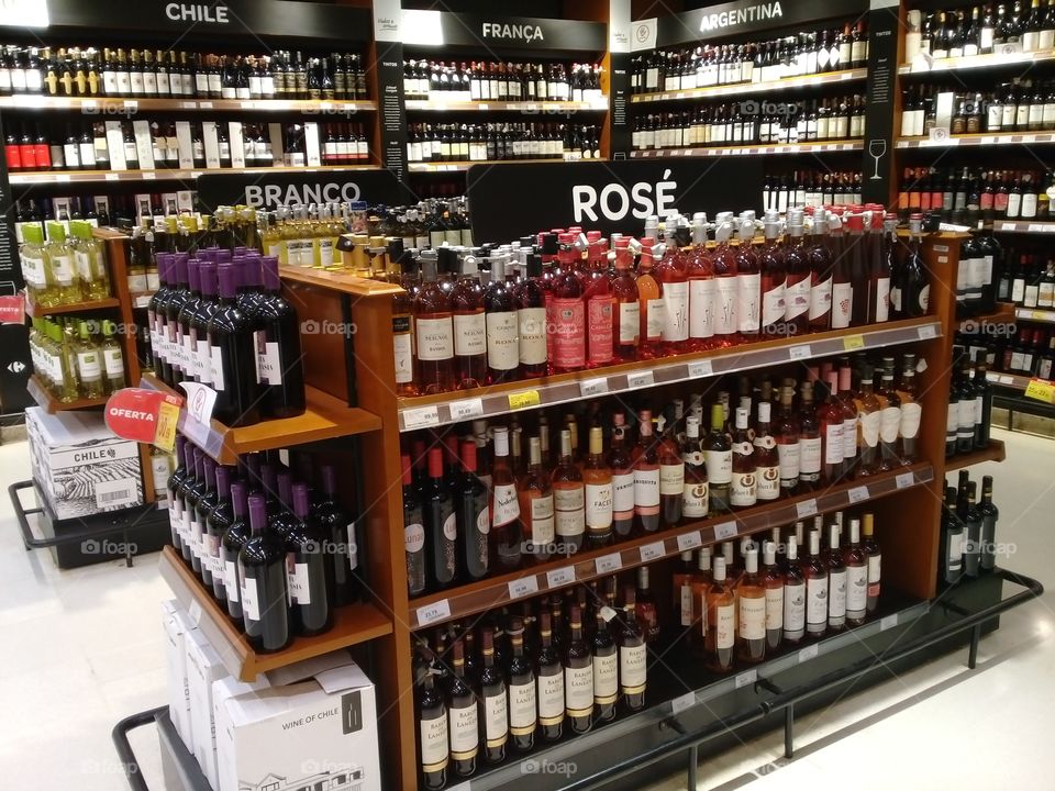 Various types of wines.  From Brazil, Chile.  Argentine.  France. . Carrefour supermarket