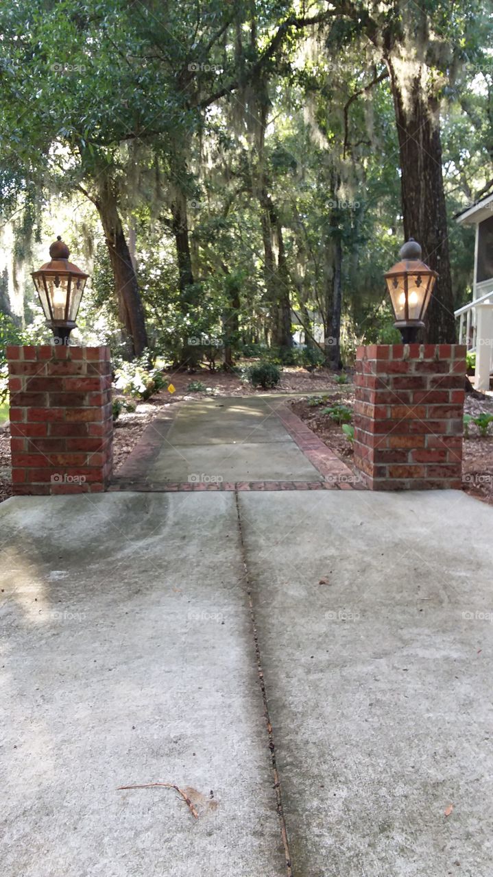 shapes rectangles  bricks concrete sidewalk driveway