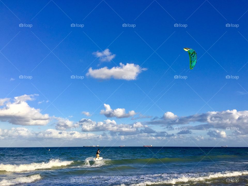 Man doing kiteboarding in the beach, Fort Lauderdale, Florida, USA 