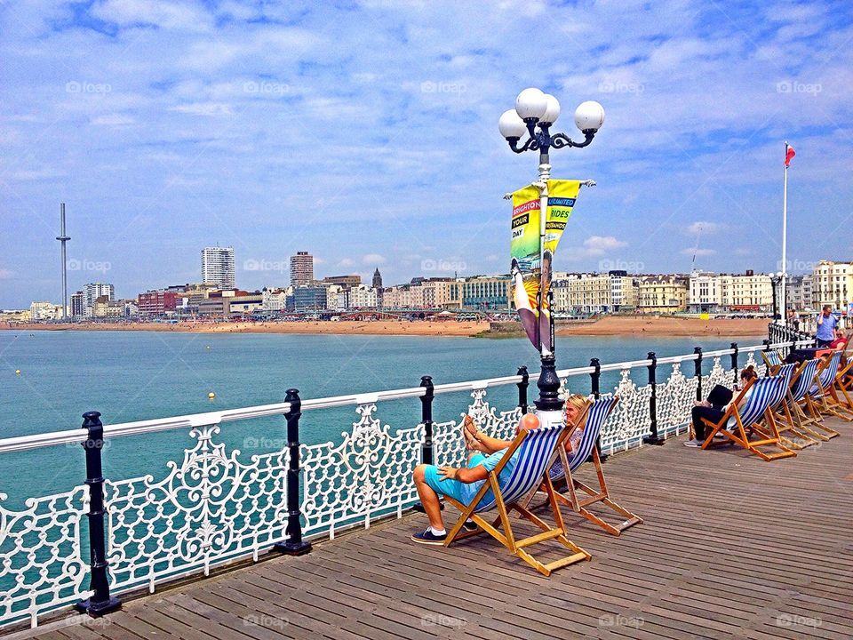 Sunbathing on pier