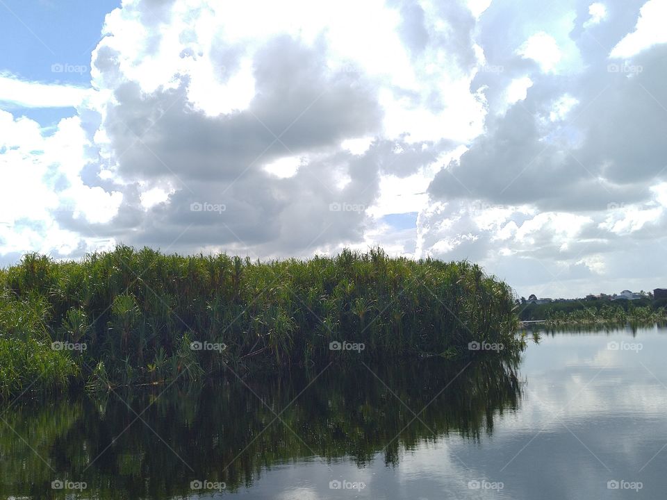 The landscape reflection of river and clouds