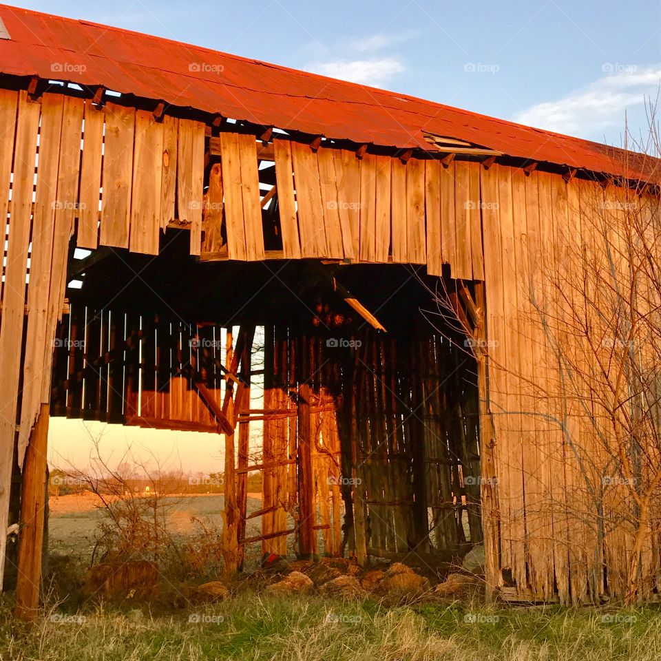 Old barn at sunset