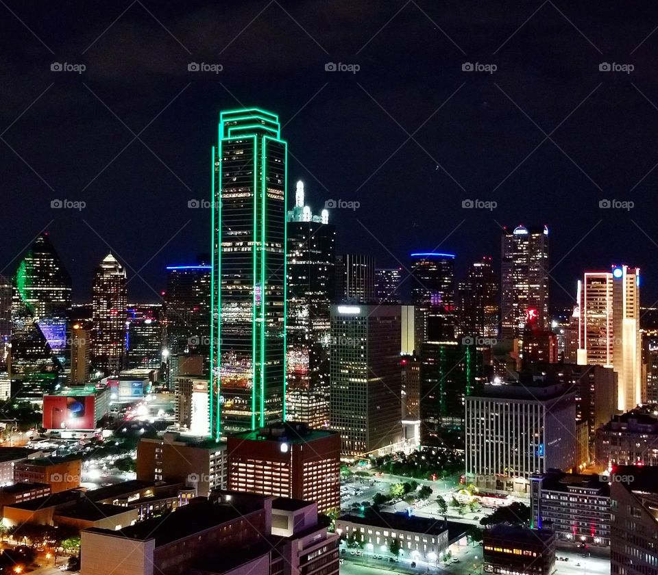 Colorful lit up cityscape skyline of downtown Dallas Texas at night