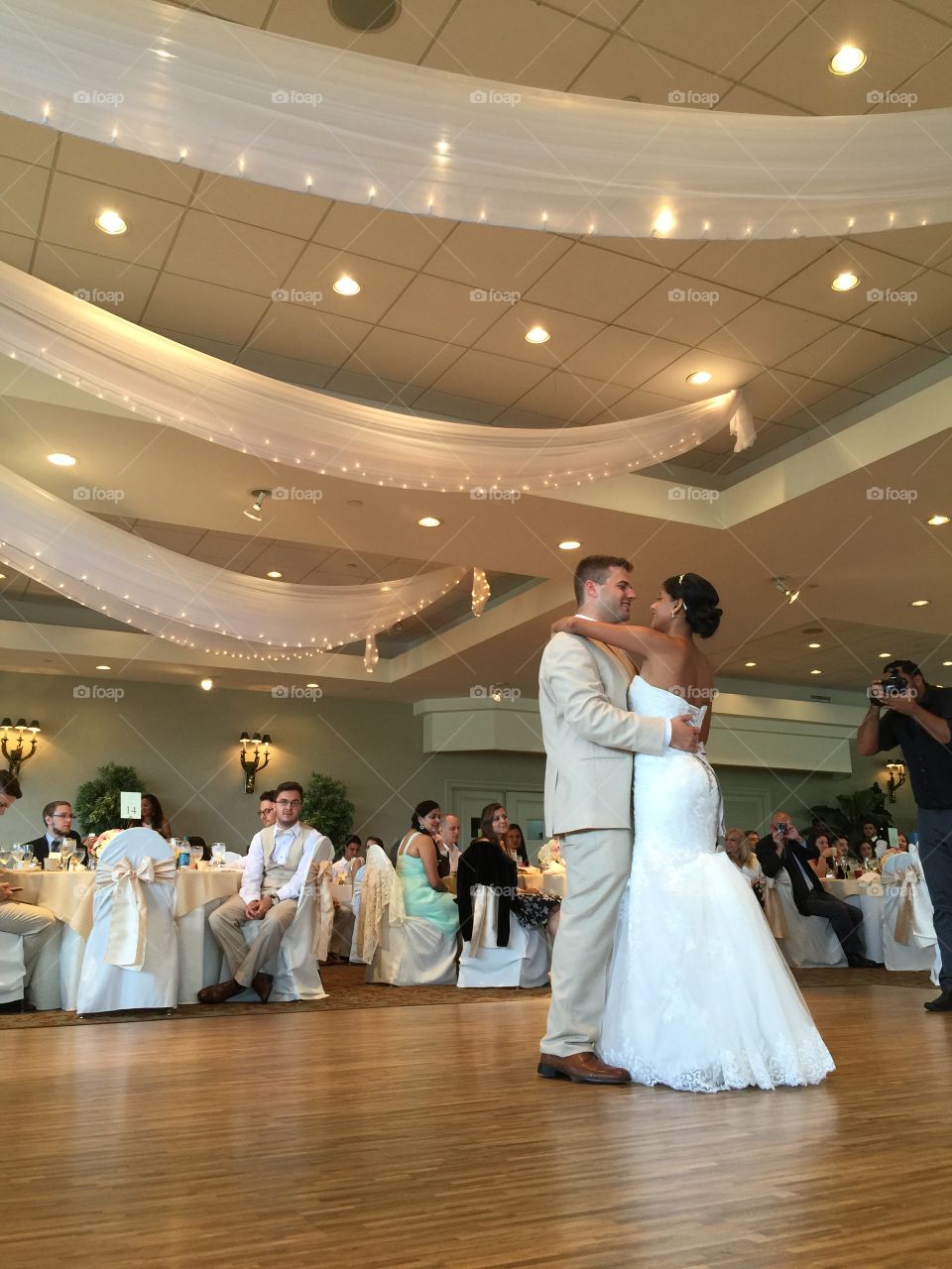 Wedding. Bride and groom dancing in a party