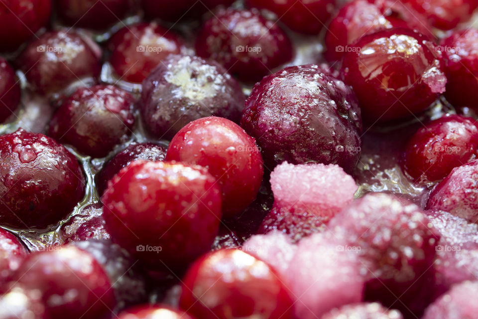 sour candied cherry cooking . Cherry jam as a background close up, macro shot