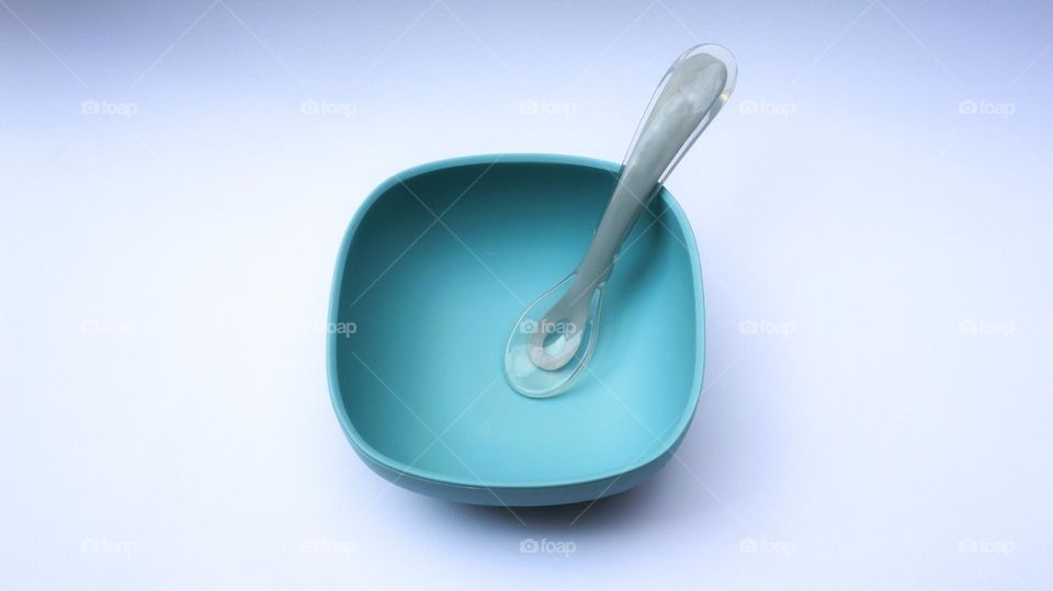 Blue color baby plate and spoon made from silicone, safety for baby for daily meal start from 6 month age.