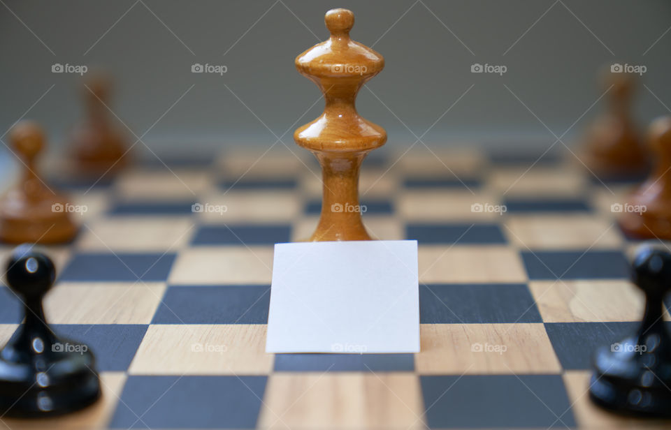 Concept chess pieces expressing social distancing