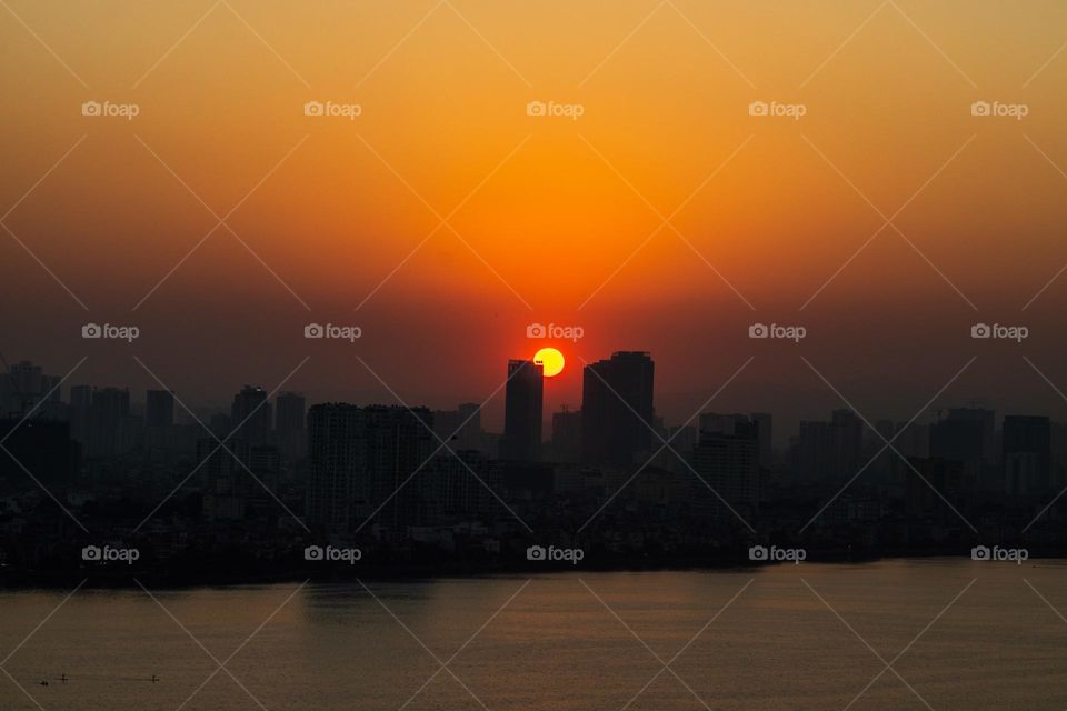 Beautiful sunset over the city, circle shape 