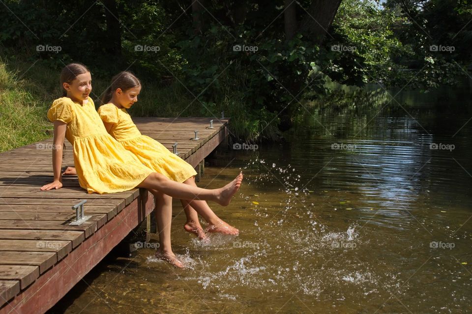 Girls in yellow dresses