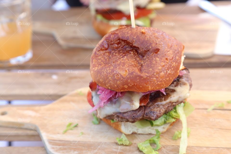 Homemade delicious hamburger to be eaten outside 