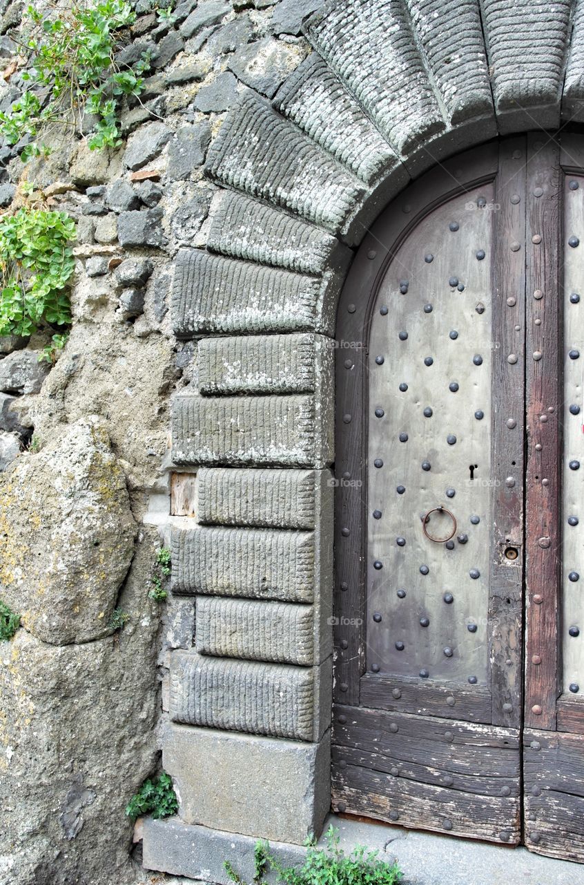 Ancient door at bracciano, italy